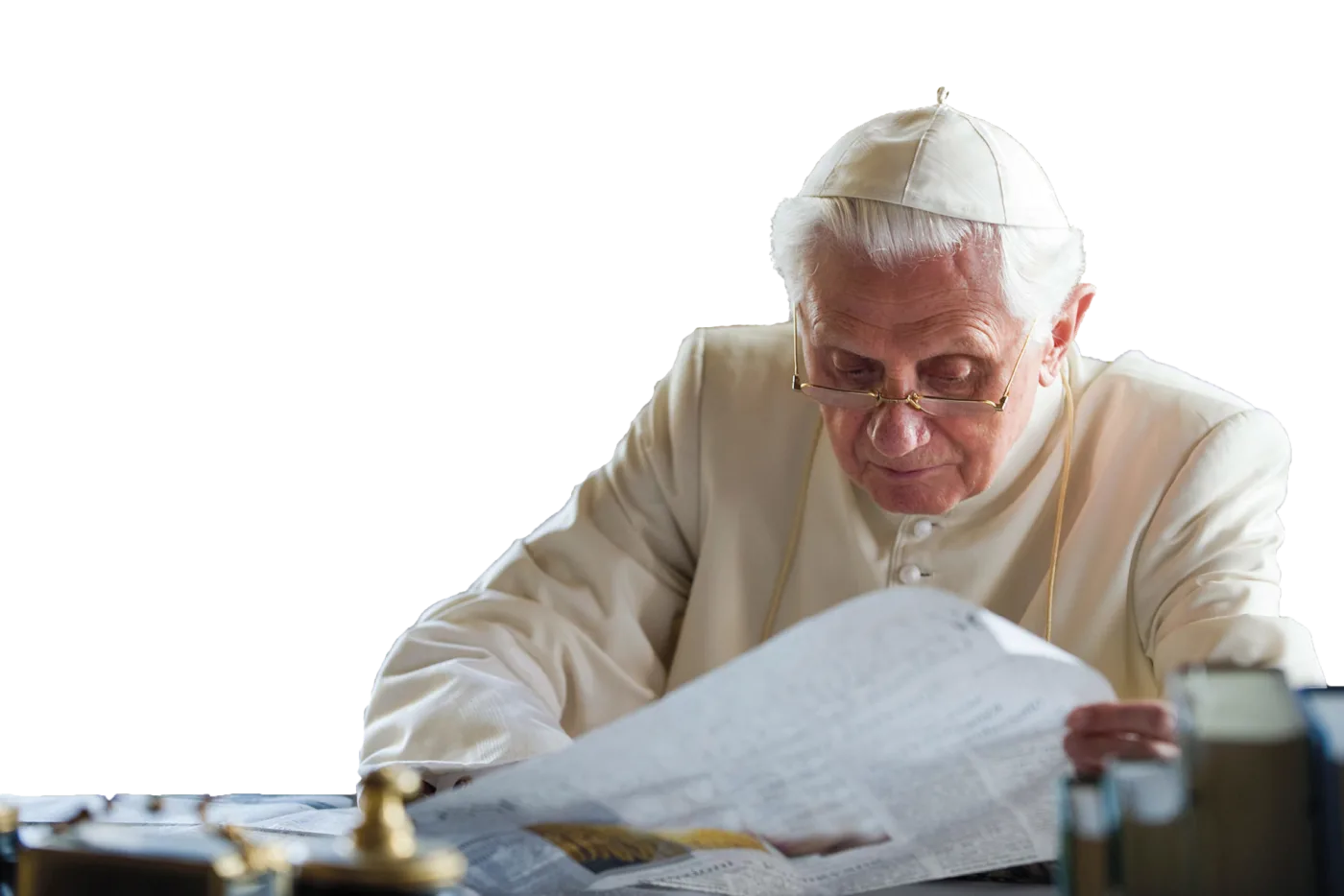 Pope Benedict XVI reading Die Tagespost